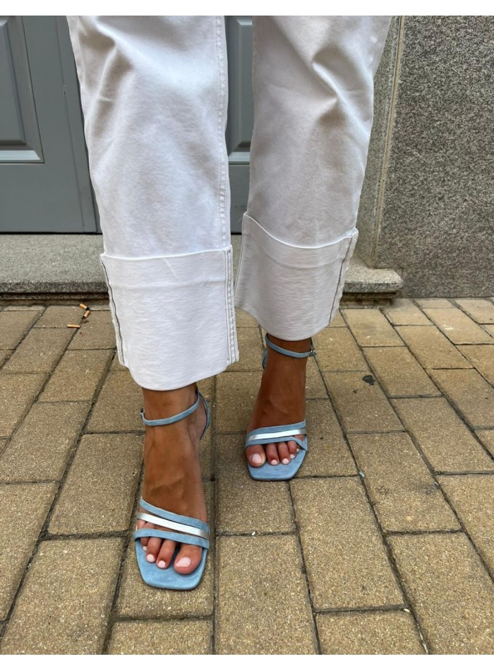 Blue party sandal with straps tied at the ankle