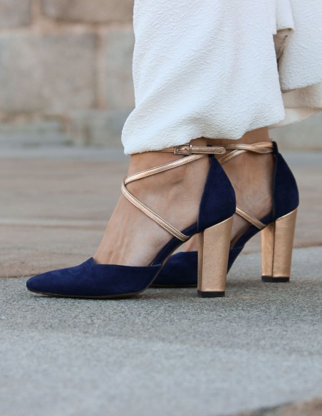 Navy blue suede pumps with gold details