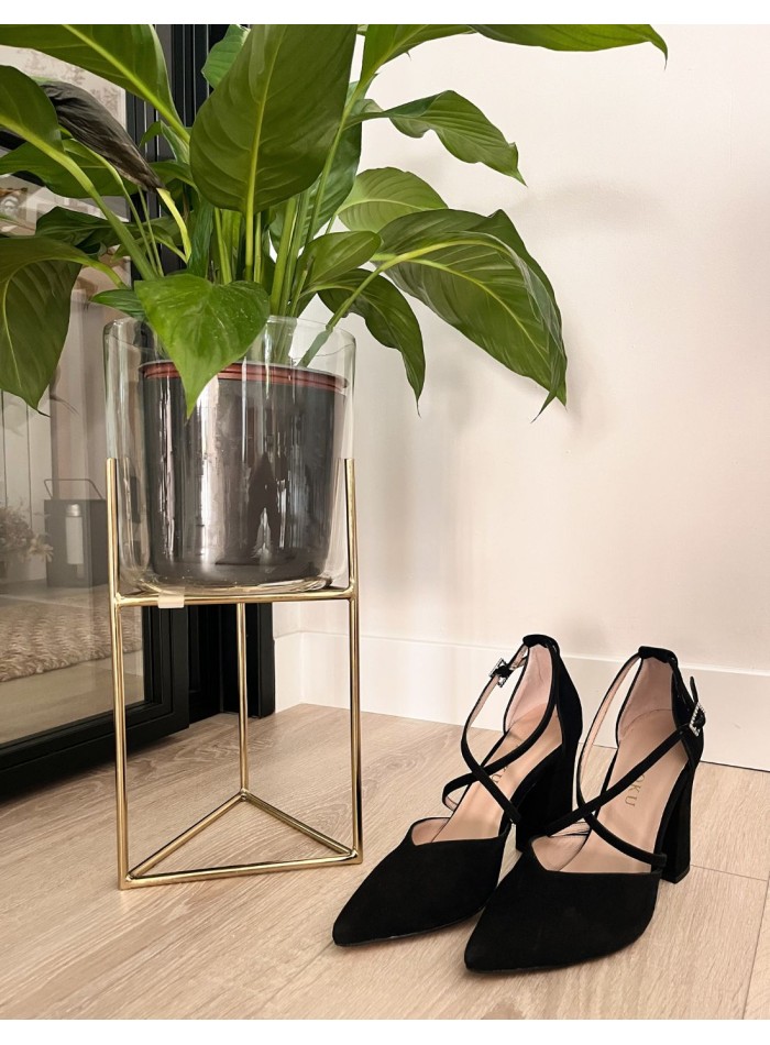 Black suede pumps with crossed straps