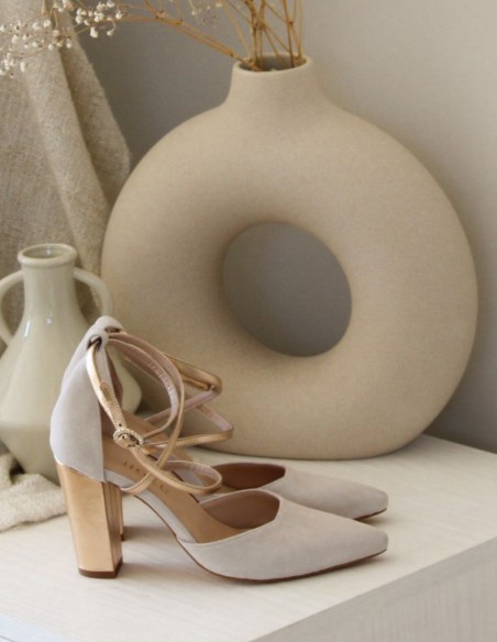 Beige suede pumps with golden details