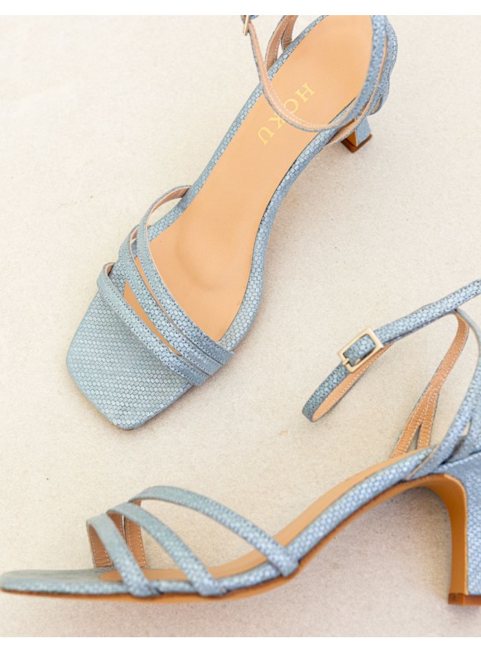 Blue party sandal with straps tied at the ankle