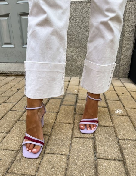 Bicolor party sandal with straps tied at ankle