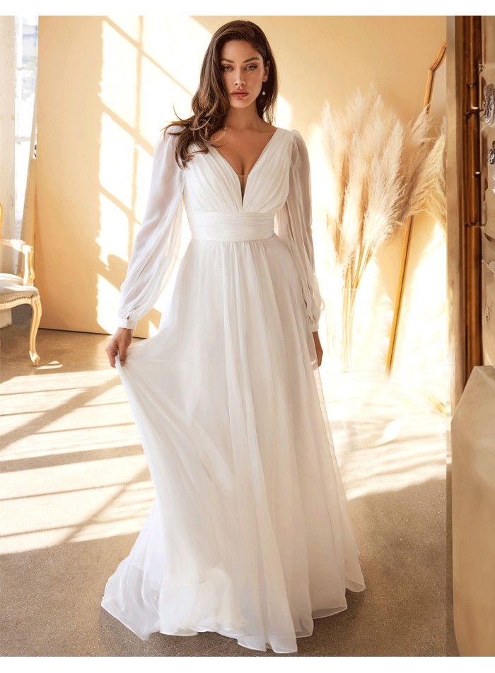 Chiffon wedding dress with long sleeves and...