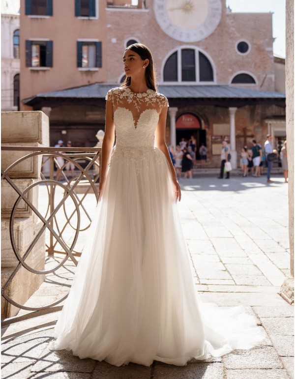 Robe de mariée longue en tulle avec corsage brodé à effet...