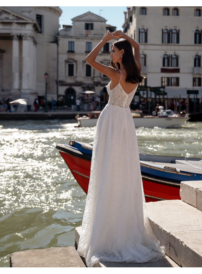 Ivory wedding dress with beaded neckline and...