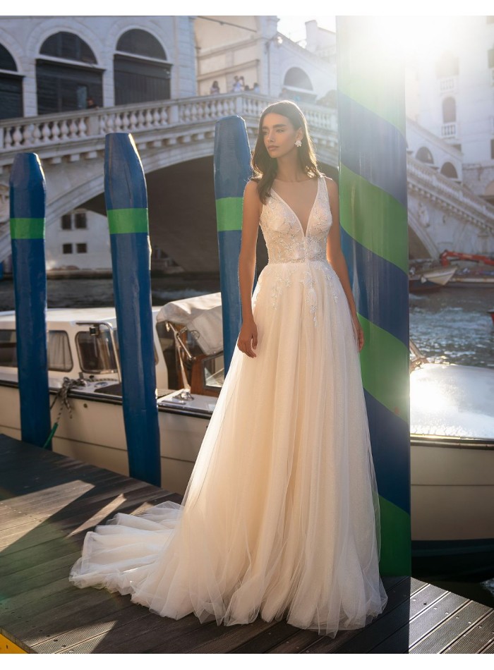 Ivory long wedding dress with V-neckline and...