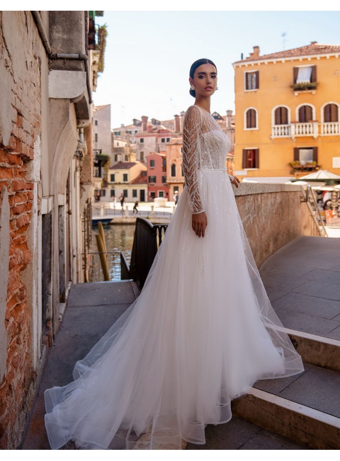 Long princess cut wedding dress with long...