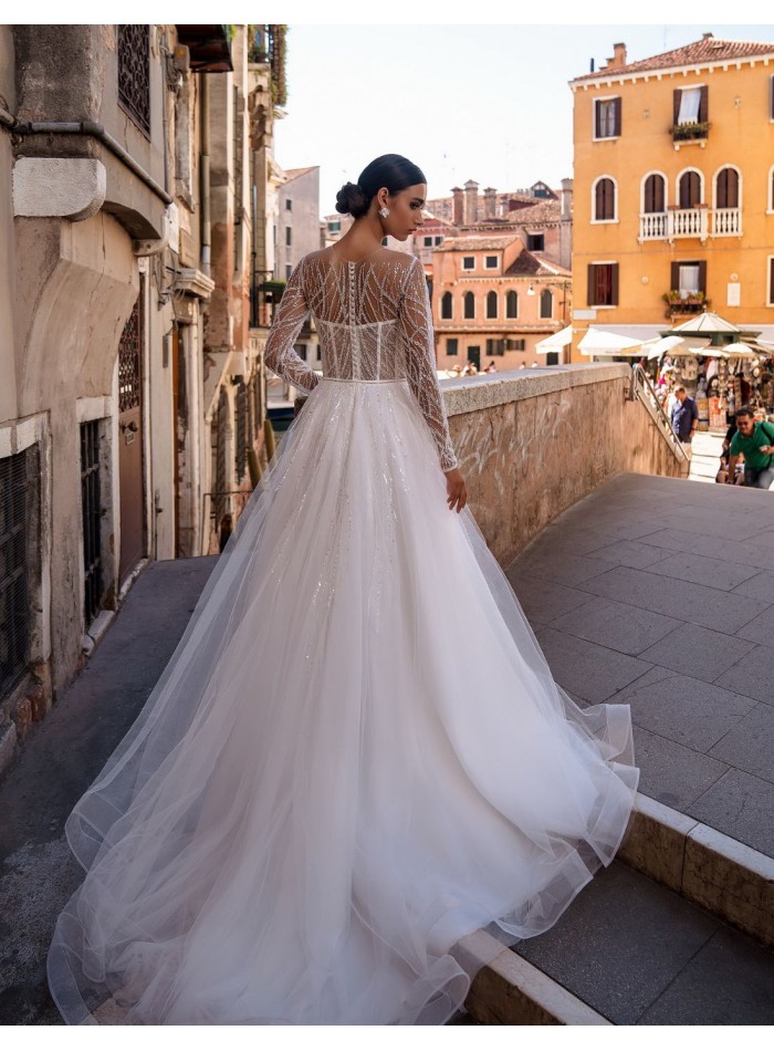 Long princess cut wedding dress with long...