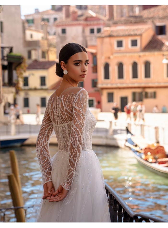 Long princess cut wedding dress with long...