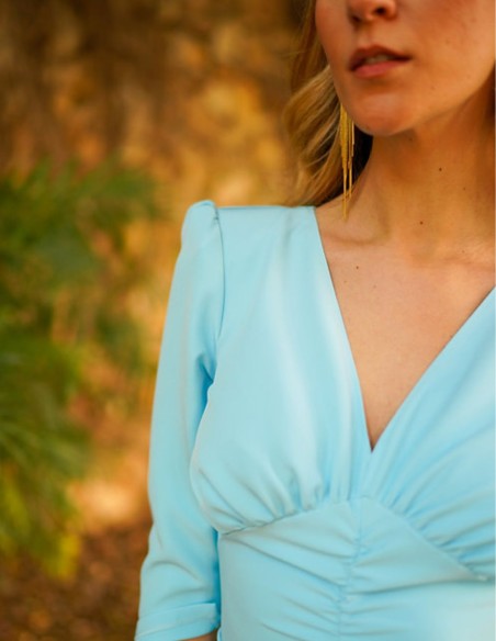 Light blue midi dress with long sleeves and flounce skirt