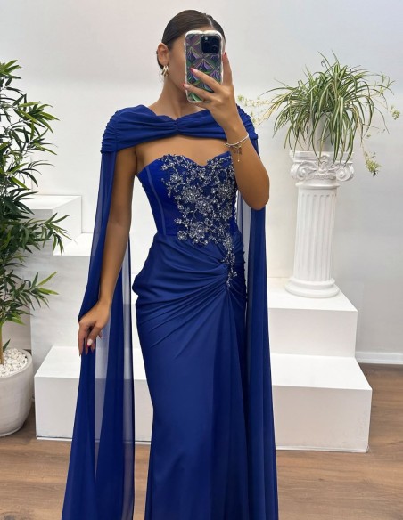 Evening dress with rhinestone neckline, draped detail and cape