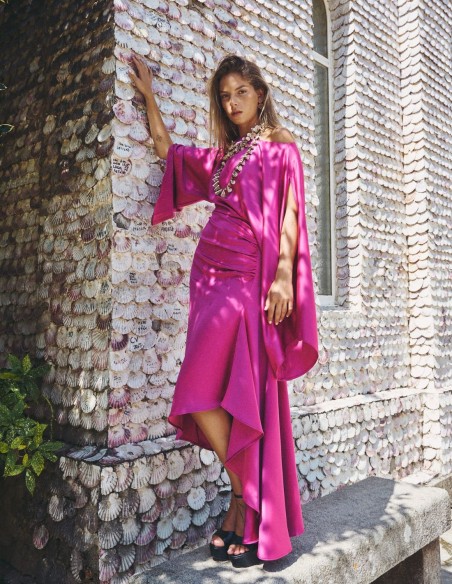 Asymmetric party dress with bat sleeves