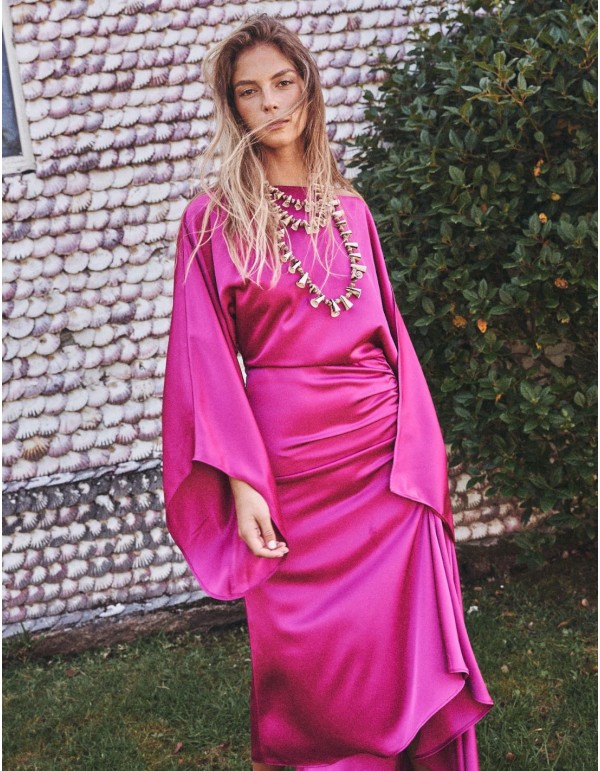 Asymmetric party dress with bat sleeves