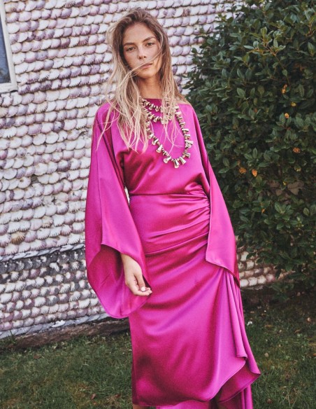 Asymmetric party dress with bat sleeves