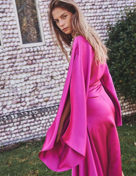 Asymmetric party dress with bat sleeves