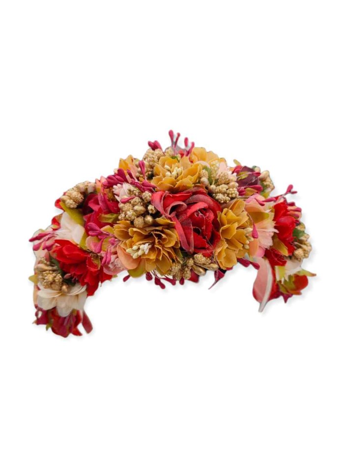 Diadema de flores para invitada en tonos rojos
